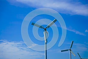 Large wind turbines are used to produce electricity. Used as a clean energy and beautiful sky