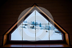 Large window with beautiful views of nature and snow