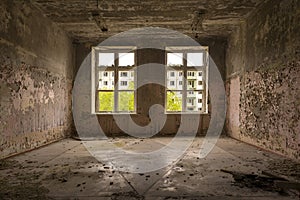 Large window in a ruined house, inside view