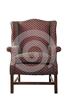 Large wing chair upholstered in red old antique isolated