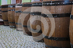 Large wooden barrels for alcohol. Storage of alcoholic beverages