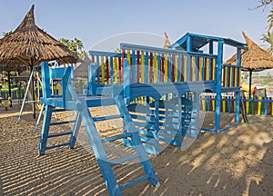 Large wooden climbing frame in children`s playground area