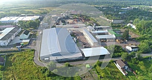 Large woodworking factory top view. A flight over a woodworking factory. General plan of a modern furniture factory