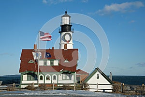 Large Wreath Displays on Oldest Lighthouse in Maine During Holiday Season