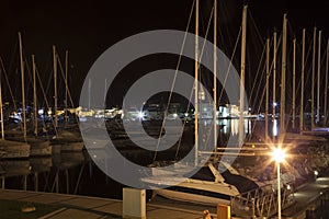 Large yacht harbor in the night