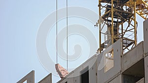 Large yellow construction crane above the building.