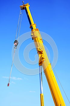 Large yellow telescopic crane photo