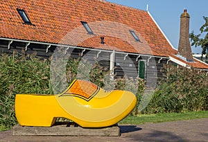 Large yellow wooden shoe in Zaanse Schans