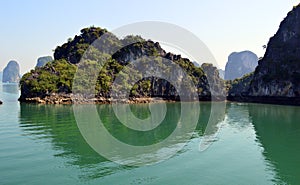 Larger limestone karsts in Halong Bay Vietnam 