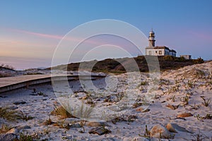 LariÃÂ±o lighthouse at sunset
