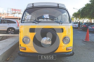 Larnaca, Greece - July 19, 2016: Classic yellow Volkswagen Transporter camper van parked on a street at Middleton beachfront.