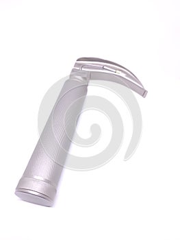 Laryngoscope handle with blade attached with it, isolated on white background