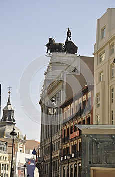 Las Cuadrigas Sculpture on Antiquo Banco Bilbao Building from Madrid City. Spain