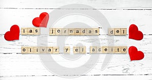 Las Jornadas del Olivar y el Aceite. words from wooden cubes with letters photo photo