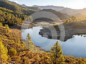 Las ninas reservoir wit sun rising behind, Grand Canary photo