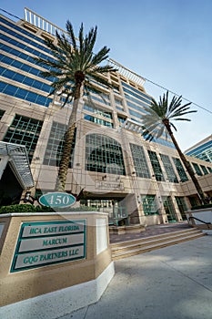 Las Olas Centre business building front view by entrance sign