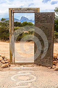 Las puertas de Can Soleil doors in Ibiza with Es Vedra island in the background