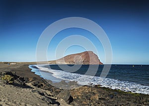 Las tejitas beach and montana roja in south tenerife spain photo