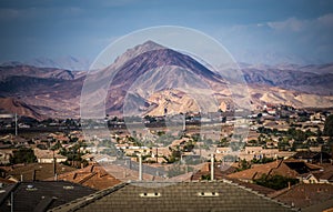 Las vegas city surrounded by red rock mountains and valley of fire