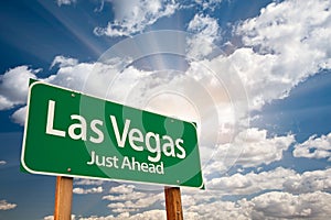 Las Vegas Green Road Sign Over Dramatic Blue Sky and Clouds