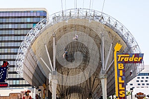 LAS VEGAS, NEVADA - August 22nd, 2016: People Zip Lining Under F