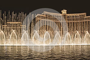 Las Vegas Bellagio Hotel Casino, featured with its world famous fountain show, at night with fountains  in Las Vegas, Nevada