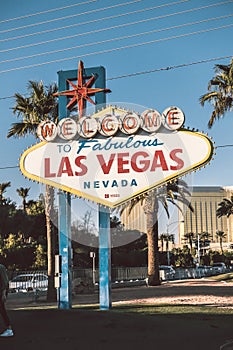 Las Vegas welcome Sign with Vegas Strip in background