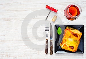 Lasagna with Rose Wine on Copy Space