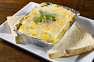 Lasagna with shredded chicken, corn and layers of cheese photo