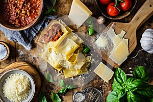 Lasagne alla Bolognese Ingredients on Wooden Countertop