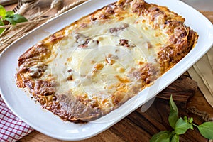 Lasagne Bolognese fresh and homemade cooked with mozzarella cheese topping