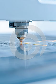 Laser cutting machine in action, showcasing precision and technology