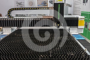 Laser cutting machine.. Cnc laser machining center. Laser cutting center. CNC laser metal processing photo