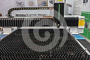 Laser cutting machine.. Cnc laser machining center. Laser cutting center. CNC laser metal processing photo