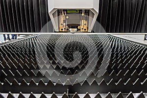 Laser cutting machine.. Cnc laser machining center. Laser cutting center. CNC laser metal processing photo
