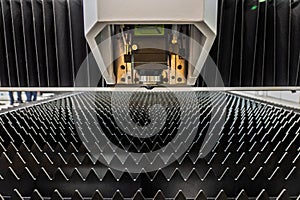Laser cutting machine.. Cnc laser machining center. Laser cutting center. CNC laser metal processing photo