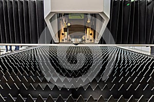 Laser cutting machine.. Cnc laser machining center. Laser cutting center. CNC laser metal processing photo