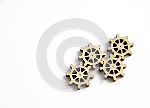 Laser cutting wooden gears on a white background