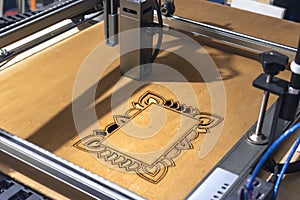 Laser engraving and cutting, using reclaimed wood, upcycling concept