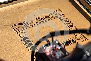 Laser engraving and cutting, using reclaimed wood, upcycling concept