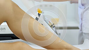 Laser epilation and cosmetology in beauty salon. Cosmetology, spa and hair removal concept