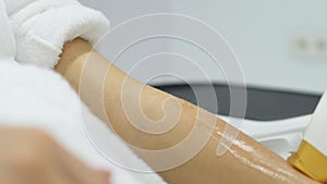 Laser epilation and cosmetology in beauty salon. Cosmetology, spa and hair removal concept