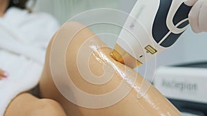 Laser epilation and cosmetology in beauty salon. Cosmetology, spa and hair removal concept