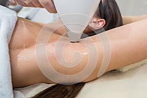 Laser hair removal and cosmetology in a beauty salon. Hair removal procedure. The concept of laser hair removal, cosmetology, spa