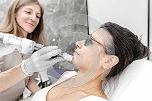 laser hair removal of the upper lip. The process of removing facial hair. Master laser hair removal removes the hair of