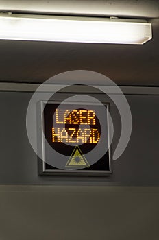 Laser hazard sign in a lab