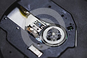 Laser head for cd or dvd player.Close up of a DVD player ejecting disc
