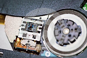 Laser head for cd or dvd player.Close up of a DVD player ejecting disc