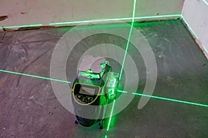 the laser level marks the lines for marking on the construction site