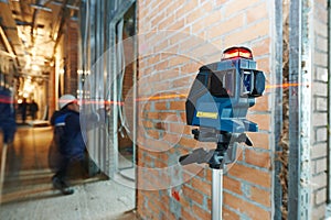 Laser level measurement at construction site